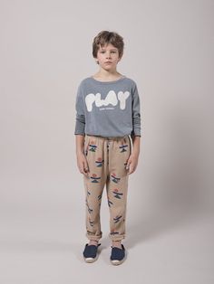 Playful Pants With Elastic Waistband And Relaxed Fit, Playful Cotton Sweatpants With Elastic Waistband, Playful Cotton Sweatpants For Loungewear, Playful Relaxed Fit Sweatpants For Loungewear, Cotton Graphic Print Bottoms For Playwear, Cotton Bottoms With Graphic Print For Playwear, Cotton Sweatpants With Elastic Waistband For Playtime, Casual Cotton Sweatpants For Playtime, Playful Sweatpants With Elastic Waistband For Loungewear