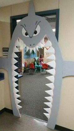 an office door decorated to look like a shark