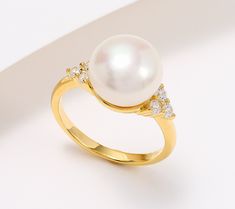 Starring a button-shaped cultured freshwater pearl at center stage, this scene-stealing ring also features cubic zirconia Diamonique simulated diamonds in a supporting turn on the sides. From Honora.    Original item is J431753. This product may be a customer return, vendor sample, or on-air display and is not in its originally manufactured condition. It may not be new. In some instances, these items are repackaged by QVC. Diamonique Rings, Triangular Pattern, Ring Size Guide, Center Stage, Cultured Pearls, Pretty Things, Prong Setting, Freshwater Pearls, Cubic Zirconia