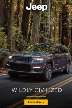 a jeep driving down a forest road with the words jeep on it's side