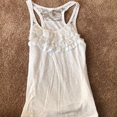 Size Medium But Fits Like An Xs!!! Would Be Adorable For A Very Petite Person Or Child In The Summer. Never Worn. White Stretch Tank Top With Ruffles, White Casual Tank Top With Ruffled Straps, Casual White Tank Top With Ruffled Straps, White Tops With Lace Trim And Ruffled Straps, Casual White Tops With Ruffled Straps, Casual Tops With Lace Trim And Ruffled Straps, White Ruffled Tank Top, White Tank Top With Ruffled Straps For Day Out, White Ruffled Straps Tank Top For Day Out