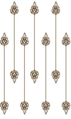 four different types of metal ornaments on a white background, one is gold and the other is brown