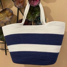 New With Tag. Color Is Navy Blue And Cream. Casual Navy Shoulder Bag, Blue Beach Bag For Everyday Spring Use, Blue Beach Bag For Everyday Use In Spring, Casual Navy Tote Shoulder Bag, Blue Everyday Beach Bag For Spring, Chic Blue Tote Beach Bag, Casual Blue Beach Bag With Braided Handles, Casual Navy Bucket Bag, Casual Cream Canvas Beach Bag