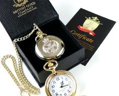 A British Gold Company official branded production complete with signed / dated certificate enclosed within a gold-lined envelope.Housed within a luxurious display / presentation case sealed and ribbon-wrapped.THE ROYAL GREEN JACKETS  - Full Hunter    24k Gold Plated Pocket WatchThis beautiful Pocket Watch has been plated in pure gold and is accompanied by a signed and dated certificate enclosed within a gold-lined envelope.The front of the case features highly decorative crest skilfully diamond Luxury Quartz Pocket Watch, Luxury Gold Pocket Watch As Gift, Luxury Gold Pocket Watch Gift, Elegant Gold Pocket Watch Gift, Elegant Gold Pocket Watch As Gift, Classic Gold Pocket Watch Collectible, Classic Gold Pocket Watch For Collectors, Luxury Gold Engraved Pocket Watch, Military Gift