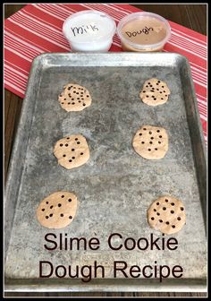 some cookies that are sitting on a cookie sheet with the words slime cookie dough recipe