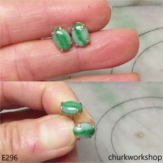 Green cabochon jade ear studs •Color: Light green with splotches apple green•Cut: Cabochon•Diameter: 9.1 mm•Width: 6.4 mm •Thickness: 3.5 mm•Weight: 1.9 grams with setting•Translucency: Opaque•Setting: 14K yellow gold•Code: E296 Symbolizes: Good luck, protection, longevity These hand crafted jade earrings are guaranteed to be 100% natural, non-enhanced, and untreated We do our best to keep the photos the same as the item; these photos are not enhanced or edited. Please keep in mind that the colo Jade Bangle, Jade Earrings, Jade Ring, Jade Bracelet, Jade Stone, Apple Green, Green Jade, Jade Green, Ear Studs