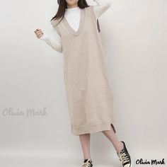 Olivia Mark - Stylish Oversized Sweater Vest Maxi Dress with Wide Neckline and Sleeveless Design Beige Sleeveless Sweater Vest For Winter, Sleeveless Denim Vest For Fall, Casual Sleeveless Sweater Vest For Spring, Casual Beige Sleeveless Dress, Oversized Sleeveless Sweater Vest For Spring, Oversized Sleeveless Sweater Vest For Winter, Oversized Sleeveless Sweater Vest Casual, Sleeveless Winter Dress For Daywear, Casual Sleeveless Vest Dress For Spring