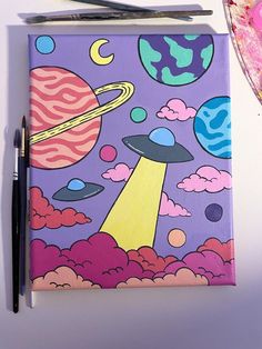 an art journal with space and planets on it