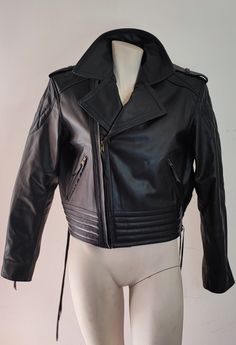 1:1 reproduction of the leather jacket used by Freddie Mercury in the 1980/81 "Queen Rock Montreal" live shows, tailor-made. Waiting time after order approximately 30 days. Rock Style Long Sleeve Leather Jacket, Rock Style Leather Jacket With Long Sleeves, Rock Style Leather Jacket For Fall, Rock Style Fitted Leather Jacket For Biker Events, Winter Leather Biker Jacket For Concerts, Punk Style Leather Jacket For Concerts, Punk Leather Jacket For Concerts, Rock Style Leather Biker Jacket For Streetwear, Leather Biker Jacket For Streetwear In Rock Style