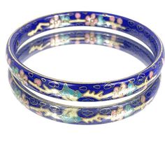 A royal blue cloisonne floral bangle bracelet in a beautiful color.The bangle has a no clasp, so it has to fit over the hand. The cloisonne is all present and very beautiful. The vermeil is in good shape, but the bracelet has been worn.The cloisonne flowers are pink and a blue,  with emerald green leaves and white branches forming a pattern inside and out.Inside diameter is 63 mm. It will slide over a hand that is 7 1/2" in diameter.  It's about 8 mm wide.  Inner circumference is 7 1/2 inches.Pl Blue Enamel Bangle Gift, Blue Enamel Bracelet For Gift, Blue Enamel Bangle As A Gift, Blue Enamel Bangle Perfect As A Gift, Blue Enamel Bangle Bracelets, Handmade Blue Enamel Bracelets, Blue Enamel Bangle Bracelet, Blue Enamel Bangle, Lapidary Supplies