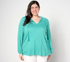 Top off your travel plans with this packable peasant style. The flowy sleeves and tasseled finishing touches are full of vacation vibes that you'll enjoy whether your staying home or exploring overseas. From Belle by Kim Gravel. Casual Peasant Top With Tassels For Fall, Vacation Peasant Top With Tassel Ties, Vacation Long Sleeve Peasant Top With Tassels, Spring Vacation Peasant Top With Tassels, Spring Peasant Top With Tassels For Vacation, Casual Green Tops With Tassels, Kim Gravel, Vacation Vibes, Flowy Sleeves