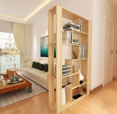 a living room filled with lots of furniture and bookshelves next to a window