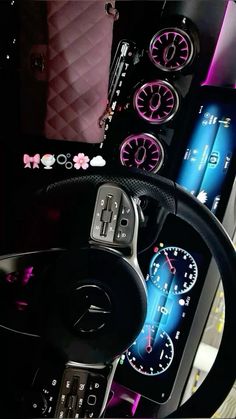 the interior of a car with various gauges and clocks