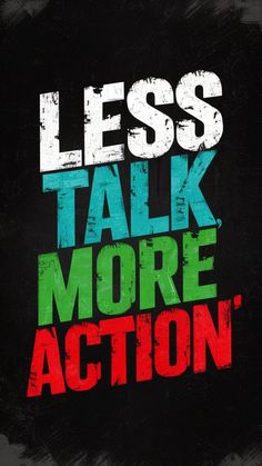 the words less talk more action are painted in red, green and blue on a black background