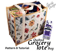 the quilted grocery tote bag has butterflies on it and is next to an empty bottle