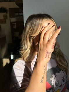 Bow tattoo on hand Bow Cover Up Tattoo, Bow On Pinky Tattoo, Bow Finger Tattoos For Women, Bow On Finger Tattoo, Bow Tattoo On Finger, Bow Tie Tattoos For Women, Bow Tattoo Behind Ear, Bow Tattoo Finger, Bow Hand Tattoo