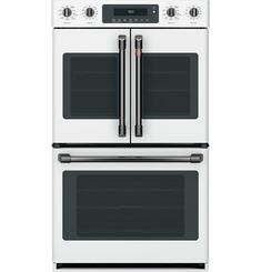 two white double ovens side by side