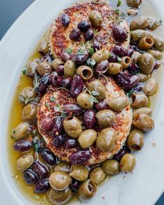 an image of some food that is on a white plate and ready to be eaten