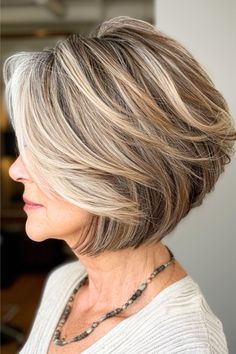 Inverted Bob with Highlights Hairstyle For Older Women. Inverted Layered Bob Hairstyles, Inverted Bob With Highlights, Angled Bob Haircuts 2024, 2024 Short Hair Trends For Women, Haircuts For 60 Year Old Women Long Bobs, Inverted Hairstyles, Hair For Older Women, Hairstyles For Women Over 50 In 2024, Youthful Hairstyles