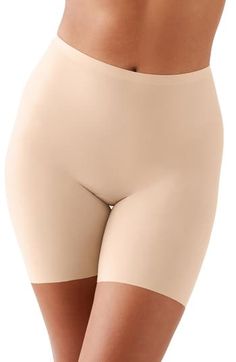 Get a sleek silhouette under outfits in these lightweight, superstretchy shaping shorts that offer allover, medium-level control and a line-free finish. 60% elastane, 40% polyamide Hand wash, dry flat Imported Fitted Shorts With Built-in Bra, Mid-thigh Length, Shapewear Seamless Biker Shorts, Seamless Shapewear Biker Shorts, Mid-thigh Length Seamless Shaping Biker Shorts, Seamless Shaping Biker Shorts In Elastane, Shaping Shapewear With Built-in Shorts In Elastane, Shaping Shorts With Built-in Bra, Shaping Shapewear Shorts Mid-thigh Length, Shaping Bottoms With Built-in Shorts