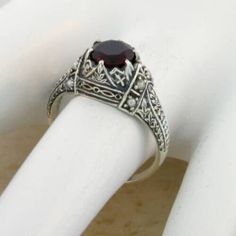 Vintage Estate Natural Garnet Filigree Ring. Pearl Accent Stones. 925 Solid Sterling Silver. The Top Of The Ring Measures 5/16 Inches In Length, Approx 9 mm. Set With One Natural 6.5 mm Garnet Stone. Stamped 925. Excellent Condition/Like New. Garnet Stone, Antique Design, Filigree Ring, Multi Stone, Multi Stone Ring, Stone Rings, Fresh Water, Garnet, Freshwater Pearls