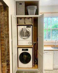 a washer and dryer in a small room