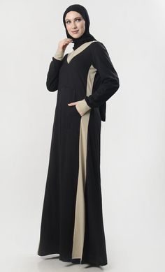 A perfect wardrobe piece for everyday Mandarin collar with front zipper Sides with black panel Front Pocket Contrast abaya yoke in front Full Sleeves with cuff FABRIC: Cotton Jersey CARE: Very Light Machine wash cold Black Long Sleeve Abaya For Fall, Modest Black Abaya With Long Sleeves, Modest Black Long Sleeve Abaya, Modest Long Sleeve Black Abaya, Black Long Abaya With Modesty Panel, Abaya With Pockets, Modest Abaya, Stylish Winter Coats, Model Gamis