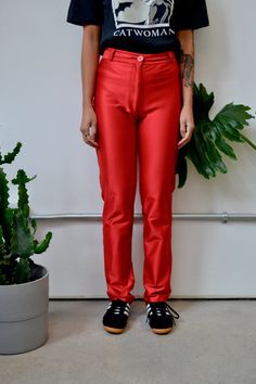 "Eighties \"Jug\" Shiny Red Spandex Pants. Zipper Fly With Button Closure. Belt Loops, Straight/Mild Tapered Leg. Very Stretchy. Two Back Pockets.  No Content Label - Feels Like Spandex No Size Tag - Fits XS/S Good Vintage Condition - Runs Near Waist and Crotch , Small Marks, Snags Waist-24\" Hips-32\"-36\" Rise-9.5\" Inseam-29\" All Sales Are Final. We have taken the time to note all size measurements and the condition of each piece so please look over all the information of the garment you are Fitted Straight Leg Summer Leggings, Red Stretch Straight Leg Pants, Red Fitted Leggings For Spring, Fitted Red Leggings For Spring, Red Straight Leg Fitted Bottoms, Red Fitted Straight Leg Bottoms, Red Fitted Straight Leg Pants, Red Stretch High-waisted Pants, Red Stretch Straight Pants