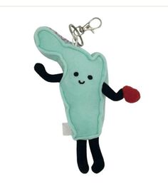 a key chain with a stuffed animal in the shape of a toothbrush on it