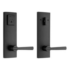 two black door handles on a white background