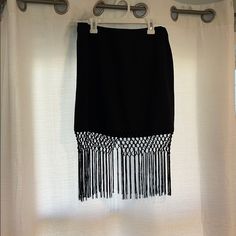 Black Trina Turk Skirt With Fringe Detail. Hidden Black Back Zipper. New Never Worn. Black Fringe Skirt For Spring, Black Fringe Mini Skirt For Spring, Black Fringe Skirt For Evening, Evening Black Skirt With Fringe, Evening Black Fringe Skirt, Black Fringe Mini Skirt, Fitted Black Mini Skirt With Fringe, Chic Black Fringe Mini Skirt, Nautical Skirt