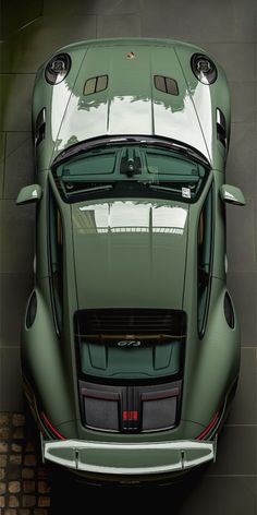 an overhead view of a green sports car