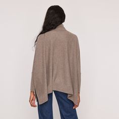 This versatile Turtleneck Poncho can be styled as a pullover or poncho, providing multiple options for a comfortable and chic look. Its one size fits all design makes it a perfect addition to any wardrobe. Made with cozy cashmere, it's sure to keep you warm and stylish during colder months. Poncho Solid Flat knit Turtleneck 25" length from shoulder 100% Cashmere 70095098A Turtleneck Poncho, Knit Turtleneck, All Design, One Size Fits All, Cashmere, Turtle Neck, Wardrobe, Design