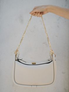 We got you this Coconuty Off White color for the New Season! Ultimate neutral color！ A stylish yet functional crossbody bag that seamlessly converts to a shoulder bag or large clutch. High end Togo leather 2 Leather chains Shoulder strap #1 (cm): 36 Shoulder strap #2 (cm): 110-170 （adjustable） Gold-toned hardware link Chain：60cm Weight: 800g Style with: Marble Chain(cm): 60 cm Shipping & Return Free US shipping on orders over $100.Free International shipping on orders over $250. For more det Versatile White Shoulder Bag With Gold-tone Hardware, Everyday Baguette Bag With Detachable Crossbody Strap, Everyday Crossbody Baguette Bag With Detachable Strap, Everyday Saddle Shoulder Bag With Gold-tone Hardware, Everyday Baguette Shoulder Bag With Gold-tone Hardware, Everyday Clutch Flap Bag With Gold-tone Hardware, Everyday Clutch Baguette Bag With Gold-tone Hardware, Everyday Clutch Shoulder Bag With Gold-tone Hardware, Everyday Baguette Clutch With Gold-tone Hardware