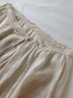 Antique Cotton Print Skirt - Etsy Feminine Beige Floral Print Bottoms, Feminine Beige Bottoms With Floral Print, Feminine Cream Skirt For Daywear, Spring Off White Relaxed Fit Skirt, Beige Floral Print Long Skirt, Long Cream Skirt With Floral Print, Beige Floral Print Skirt, Cream Long Skirt For Spring, Feminine Beige Skirt With Elastic Waistband