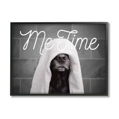 a dog wrapped in a towel with the words me time