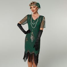 The Sequin Short Sleeves Fringe Flapper Dress combines vintage charm with modern sparkle, featuring shimmering sequins and classic short sleeves. The fringe detailing adds playful movement, evoking the glamour of the Roaring Twenties. Perfect for themed parties and special nights out, this dress is sure to make a statement. Women 1920s, Lace Evening Dress Long, Great Gatsby Dress, Party Dress Plus Size, 1920s Great Gatsby, Great Gatsby Dresses, Fringe Flapper Dress, Party Wedding Dress, Dress Cocktail Party