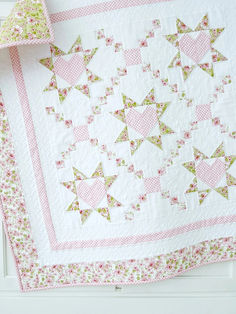 A "lovely" baby quilt pattern! The beautiful Loving Wishes Quilt Pattern captures the feeling of wishing all the best for a little one. This beautiful & easy quilt pattern is adorned with loving hearts, sweet stars and dainty paths criss-crossing. Gingham accents this quilt pattern wonderfully and a sweet border surrounds it, 5 sizes are included. Easy Quilting Patterns, Quilt Pattern Easy, Baby Boy Quilt Patterns, Boys Quilt Patterns, Shabby Chic Quilts, Easy Quilting, Bed Quilts, Heart Quilt Pattern, Chic Quilts