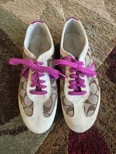 These are awesome Baylee Coach sneakers in size 8 medium.  They are in excellent vintage condition with light wear.  They were listed in a consignment shop at $189.99, but the shop a went out of business.  They can be lightly cleaned since the suede does have light signs of use, but it isn't necessary.  These are super cute and ready to go. Coach Sneakers, Vintage Baskets, Sneakers Athletic, Going Out Of Business, Lace Up Sneakers, Consignment Shops, Vintage Coach, Beige Brown, Athletic Shoes