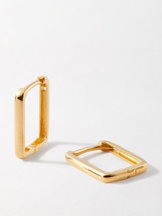 Let your ears do the talking. Step it up with these dainty rectangle huggie hoop earrings. Dress up your daily staples or take them into the night. 14k recycled solid gold. Earrings are 9.7mm x 12.5mm. Width 1.5mm width. Sold as a pair. Gold Rectangular Minimalist Huggie Earrings, Gold Oblong Huggie Earrings For Everyday, Gold Rectangular Huggie Earrings For Everyday, Classic Rectangular Huggie Earrings For Everyday, Yellow Gold Oblong Hoop Earrings For Everyday, Everyday Gold Square Huggie Earrings, Rectangular Yellow Gold Hoop Earrings For Everyday, Yellow Gold Everyday Hoop Earrings, Everyday Yellow Gold Oblong Hoop Earrings