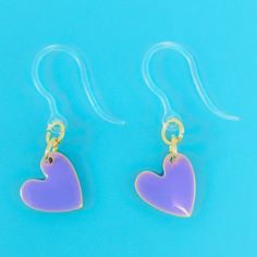 Love at first sight! Our Paint Drop Heart Earrings (Dangles) were designed with sensitive ears in mind – made with hypoallergenic plastic hooks and enough love to make your heart flutter. Fling 'em on for a look that's almost too precious for words! Earring length: 28mm Hypoallergenic Heart Drop Earrings For Gift, Hypoallergenic Heart-shaped Trendy Earrings, Trendy Purple Heart Earrings As Gift, Trendy Purple Heart Earrings For Gift, Trendy Hypoallergenic Heart Drop Earrings, Hypoallergenic Heart Drop Earrings, Trendy Purple Heart Earrings, Trendy Hypoallergenic Heart Earrings For Gifts, Earrings For Sensitive Ears