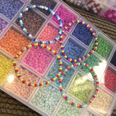 the beads have been arranged in rows and are ready to be put into their packaging