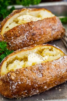 two loaves of bread with cheese and parsley