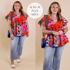 Model is wearing an orange mix floral top with a babydoll hem and deep v neckline. Model has it paired with cropped jeans, white heels, gold jewelry, and a blue purse. Hawaiian V-neck Top With Tropical Print, Summer Hawaiian V-neck Top, Floral Print V-neck Tops For Beach Season, Hawaiian V-neck Tops For Beach Season, Hawaiian V-neck Tops For Spring, Tropical V-neck Top With Floral Print, Summer V-neck Top With Multicolor Print, Multicolor Tropical Print V-neck Top, Vibrant Print V-neck Summer Tops