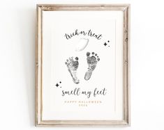 a framed print with a baby's footprints and the words, brother to me smell my feet happy halloween