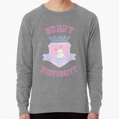 Lightweight and comfy pullovers for men and women. Preshrunk cotton blend french terry ringspun for softness. Range of colors available, with the option to print on front or back. Size range XS-3XL. Bunny University Collegiate Crest Pastel Sweatshirt, Grey Bunny, University Sweatshirts, Blue Sweatshirt, Pink Sweatshirt, Baggy Fits, Sweatshirt Designs, French Terry, Stranger Things Fanart