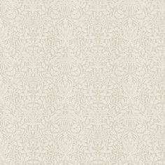 a white wallpaper with leaves and vines on the side, as well as a beige background