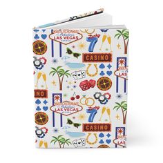 a notebook with las vegas symbols on the front and back cover, which is printed in bright colors