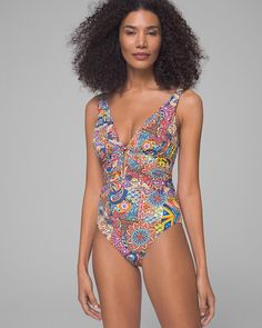 Why you’ll love it: Feel fabulous and comfortable in this one-piece swimsuit, featuring a shirred front, V-wire, molded cups, thigh-concealing design, and a lovely paisley print. By Bleu Rod Beattie. Details Shirred front for style. V-wire and molded cups for support. Thigh-concealing design. Paisley print. 87% nylon, 13% spandex. Hand wash. Imported. Underwire Printed Swimwear For Pool, Multicolor Ruched Tankini For The Pool, Multicolor Ruched Swimwear For Poolside, Multicolor Ruched Swimwear For Pool, Multicolor Ruched Tankini For Poolside, Multicolor Ruched Tankini For Beachwear, Multicolor Ruched Swimwear For Beach Season, Multicolor Ruched Swimwear, Ladies Swimwear