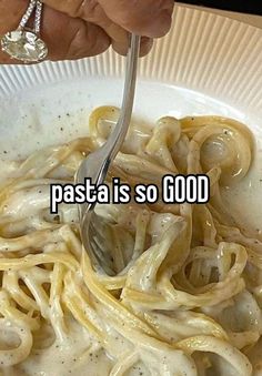 someone is eating spaghetti in a white bowl with the caption pasta is so good